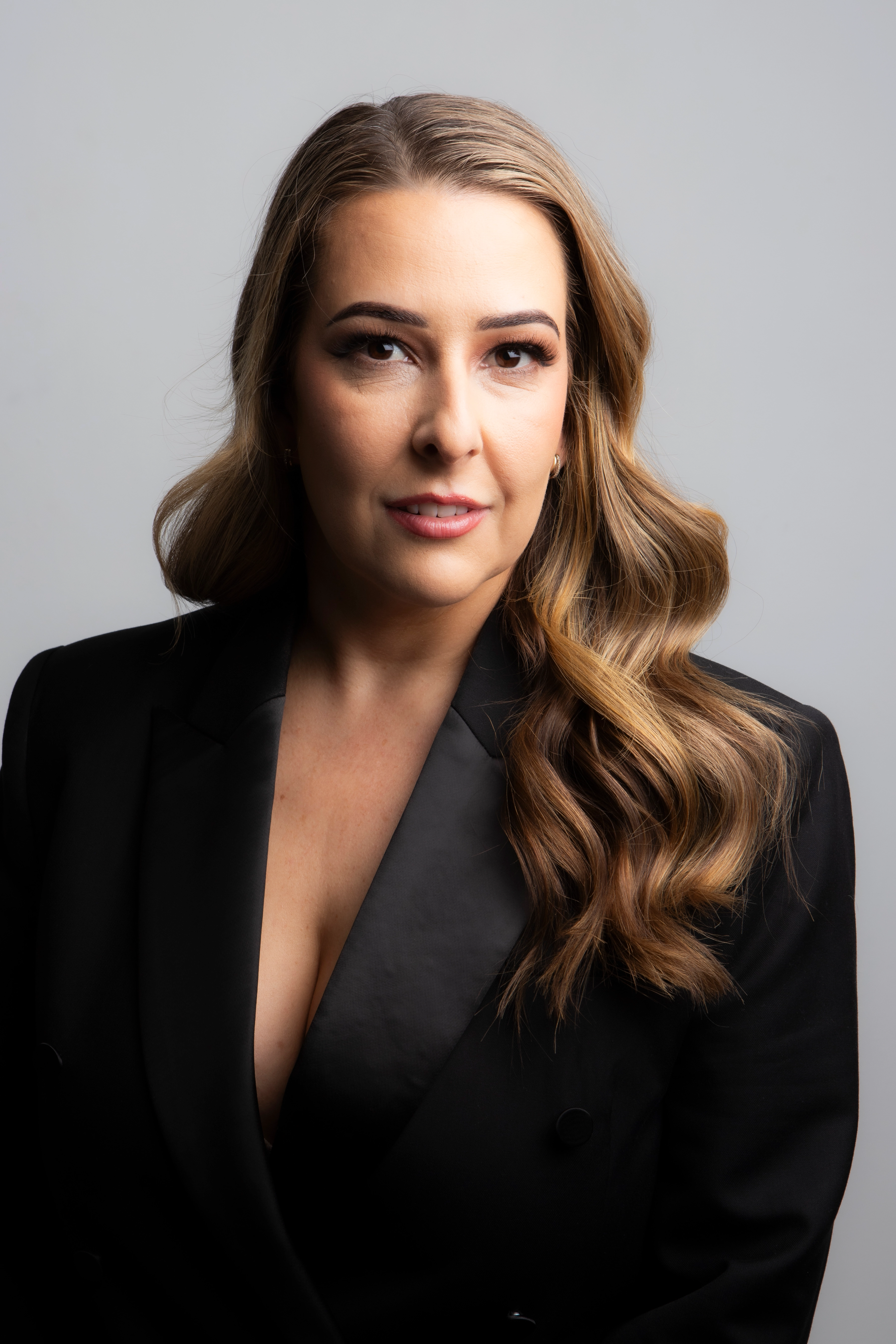 Angela, founder of Opulence Skin & Brows